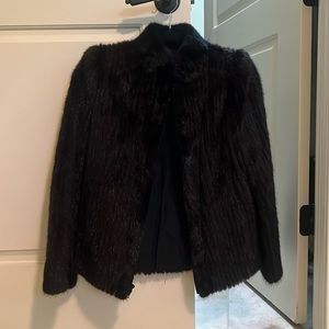 Real mink jacket, pockets both sides.